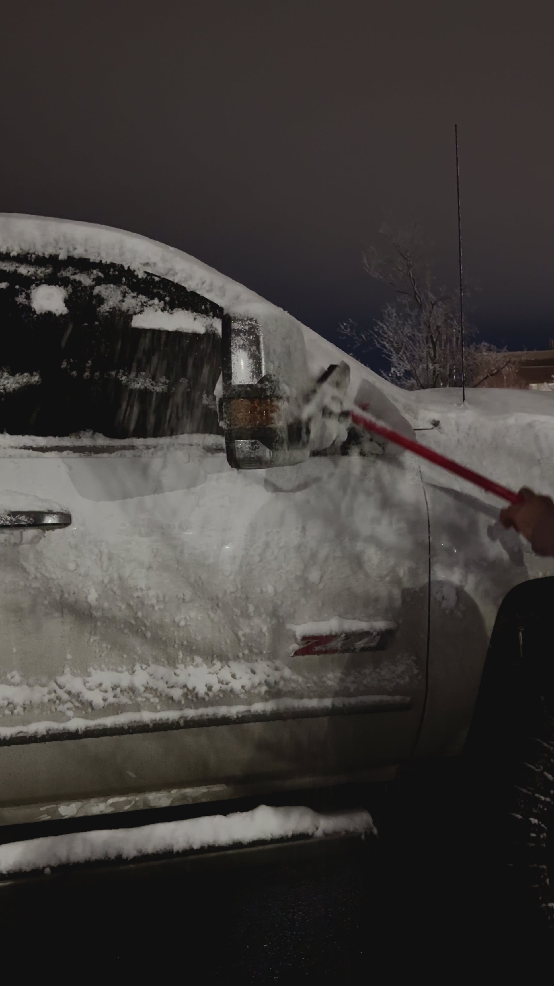 Video showing real-life example of using Forever Broom to remove snow and ice from truck windshield, windows, and doors after fresh snowfall in Utah.