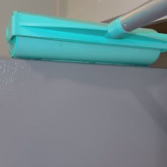 A roller cleaning a refrigerator