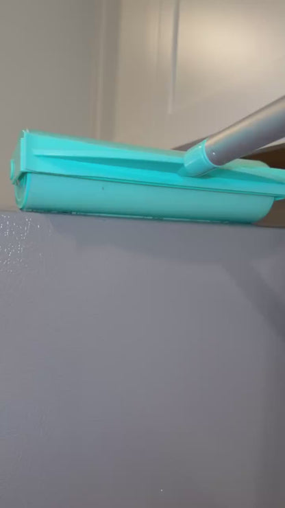 A roller cleaning a refrigerator
